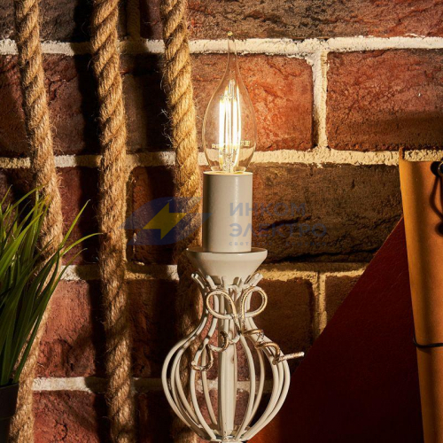 Лампа светодиодная филаментная 7.5Вт CN37 свеча на ветру прозрачная 4000К нейтр. бел. E14 600лм Rexant 604-102 фото 4